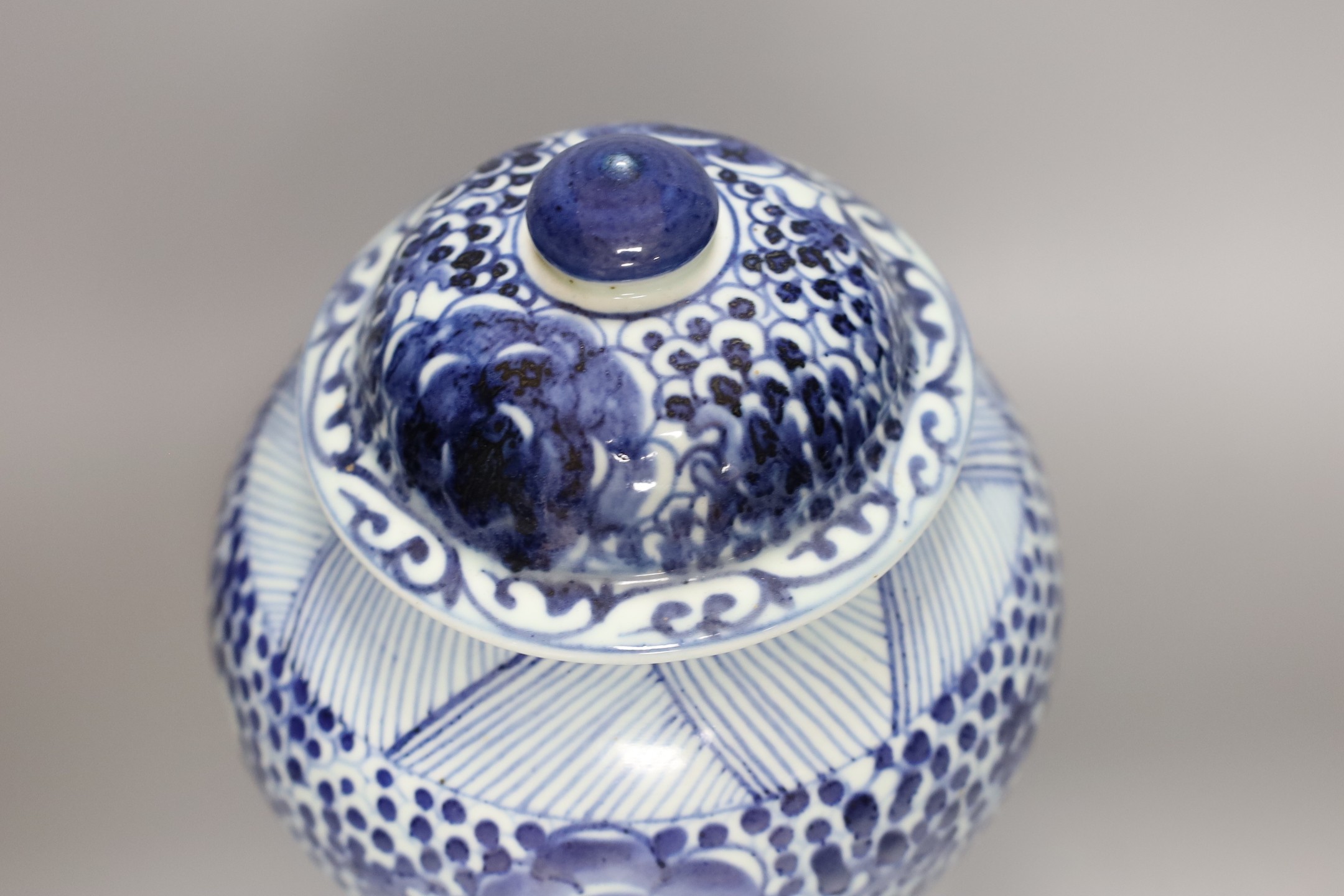 A 19th century Chinese blue and white lidded baluster vase, 28cm tall